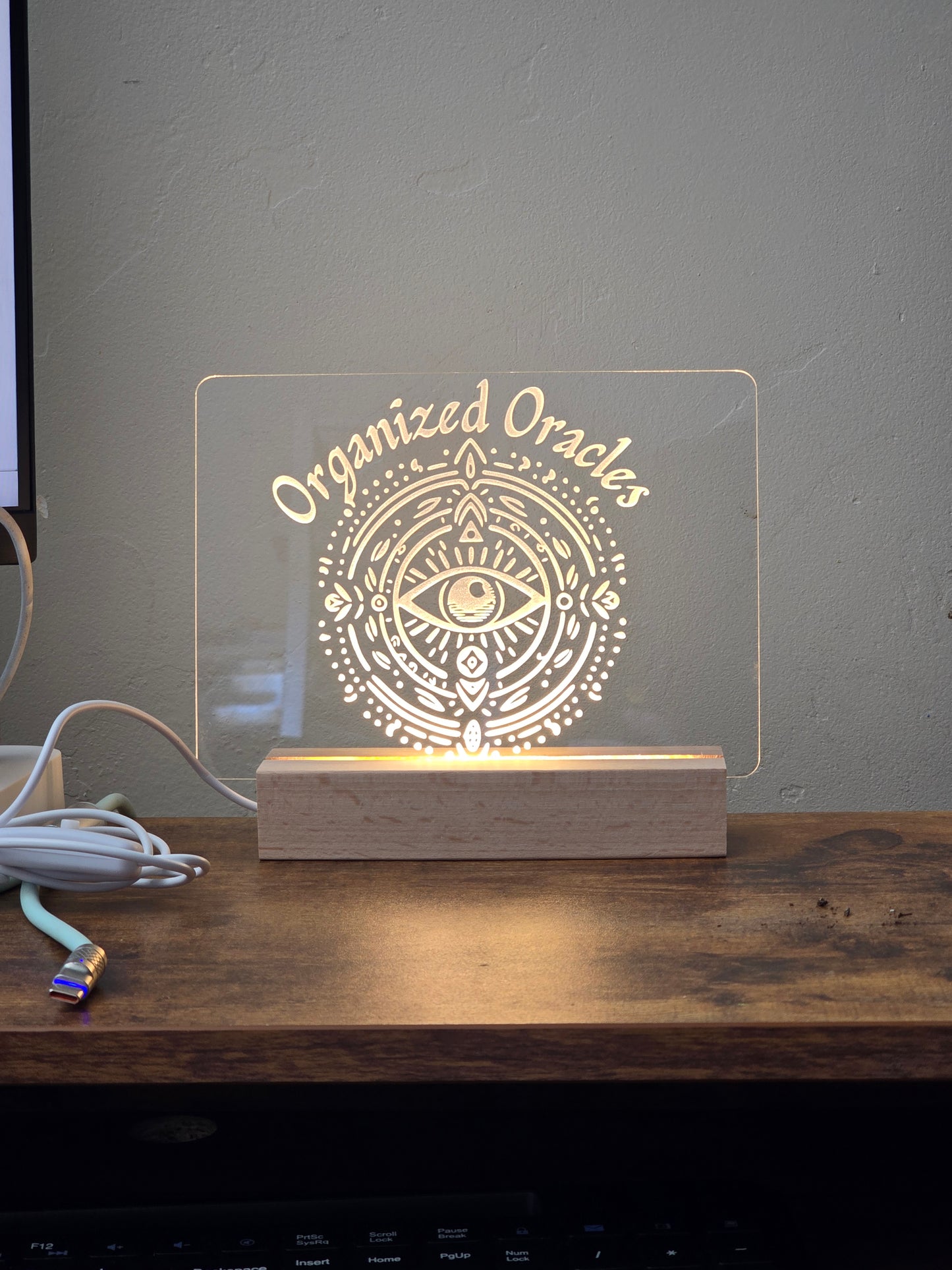 Acrylic sign with wooden LED base