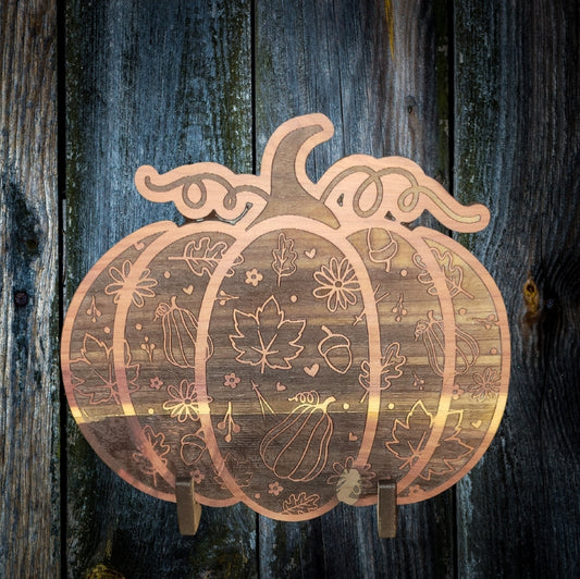 Engraved pumpkin shelf sitter